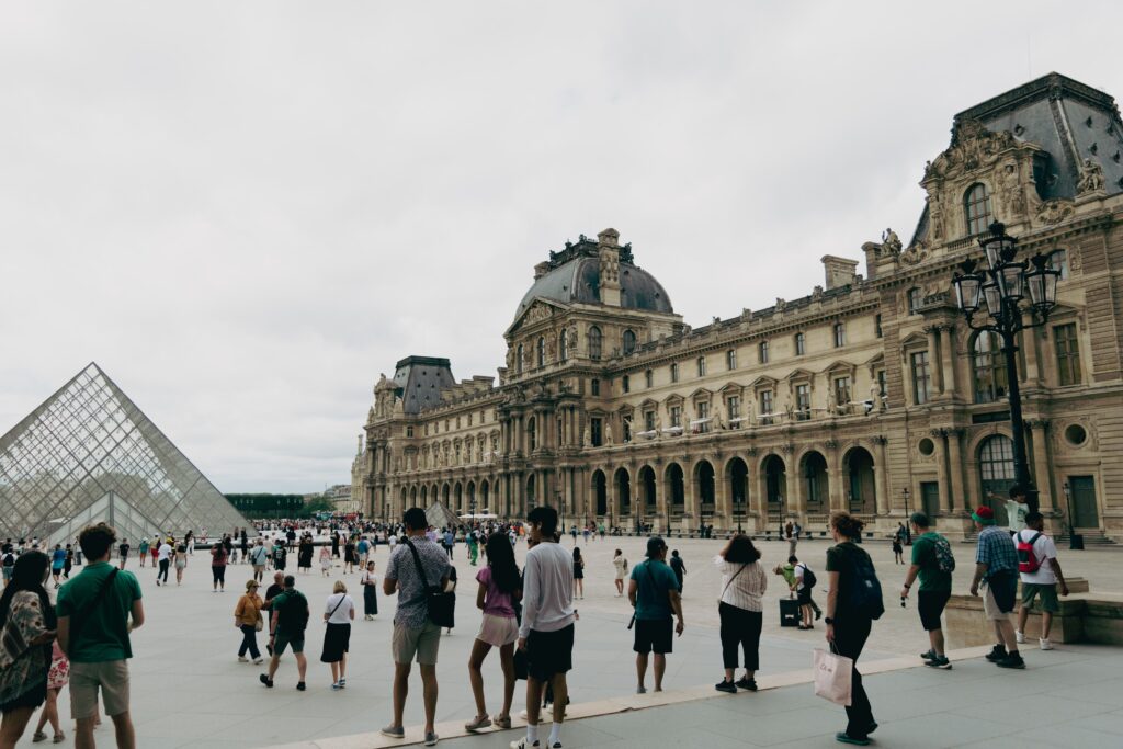 Group of travelers discovering a historic landmark and experiencing travel like a local