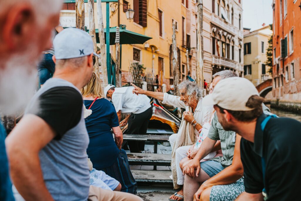traveler having a warm conversation with friendly strangers during a journey