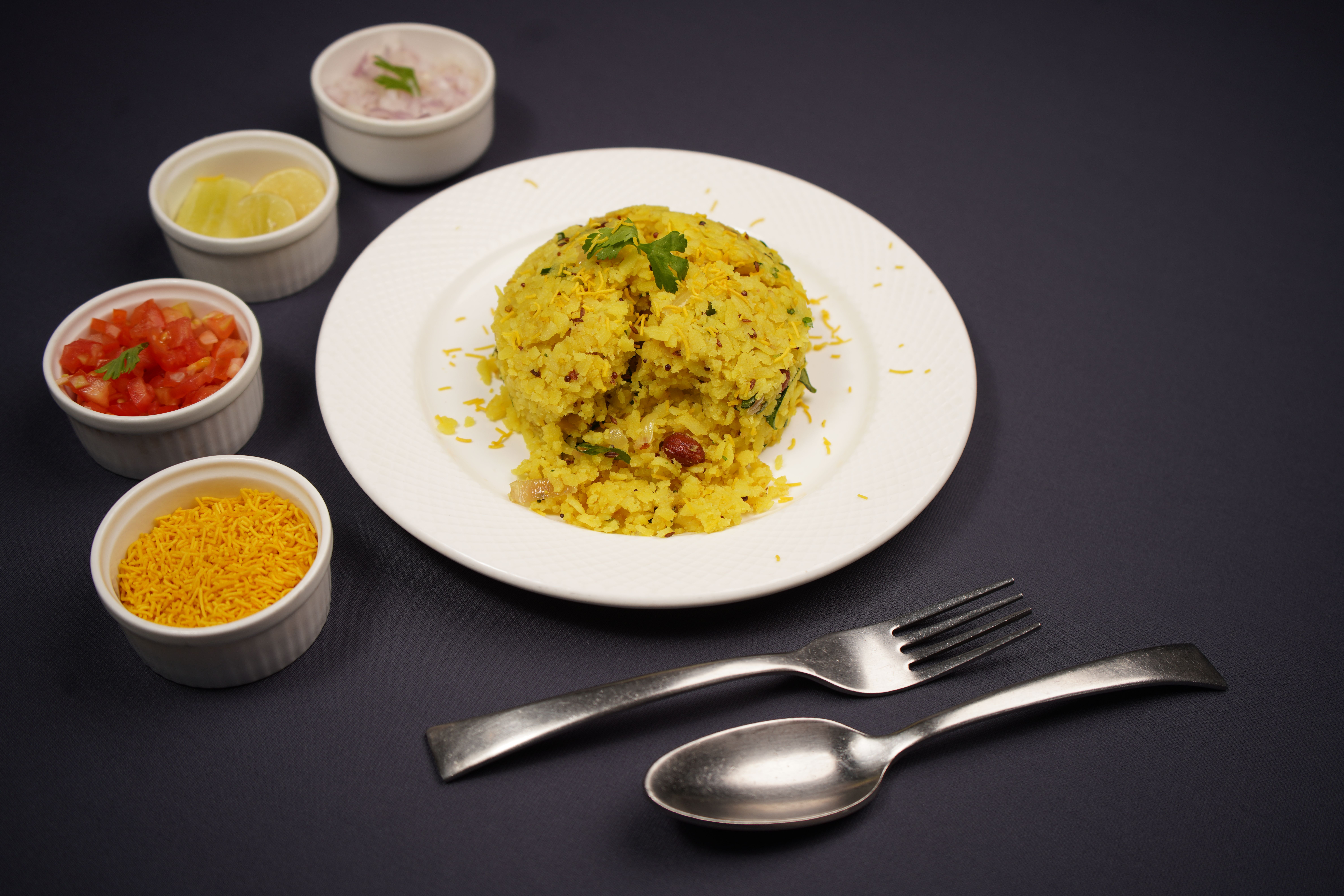 Warm vegetable upma served with fresh vegetables and herbs